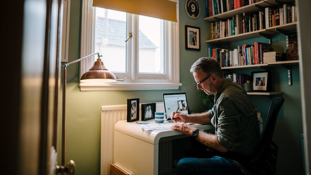 Older man working in a home office
